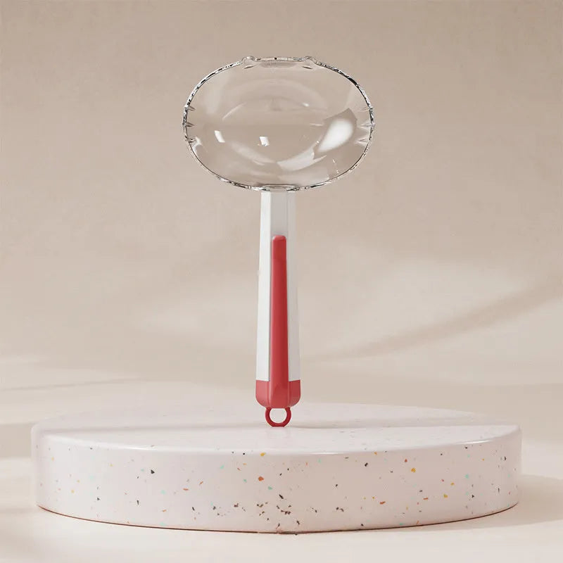 Blue pet food spoon with a metal clip attached to a dog food bag.