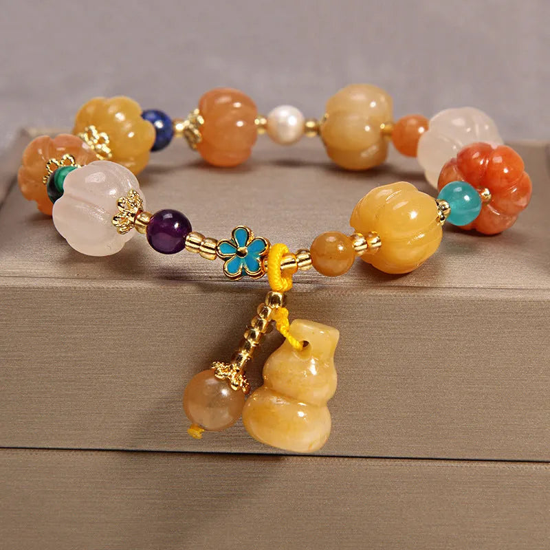 Women's yellow agate crystal bracelet on gold silk cord in khaki colour