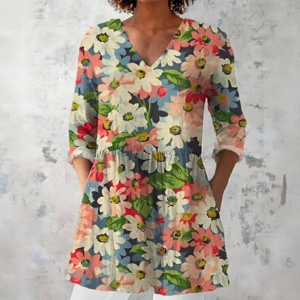 Women wearing a retro-style slim fit long-sleeved top with a digital print pattern.