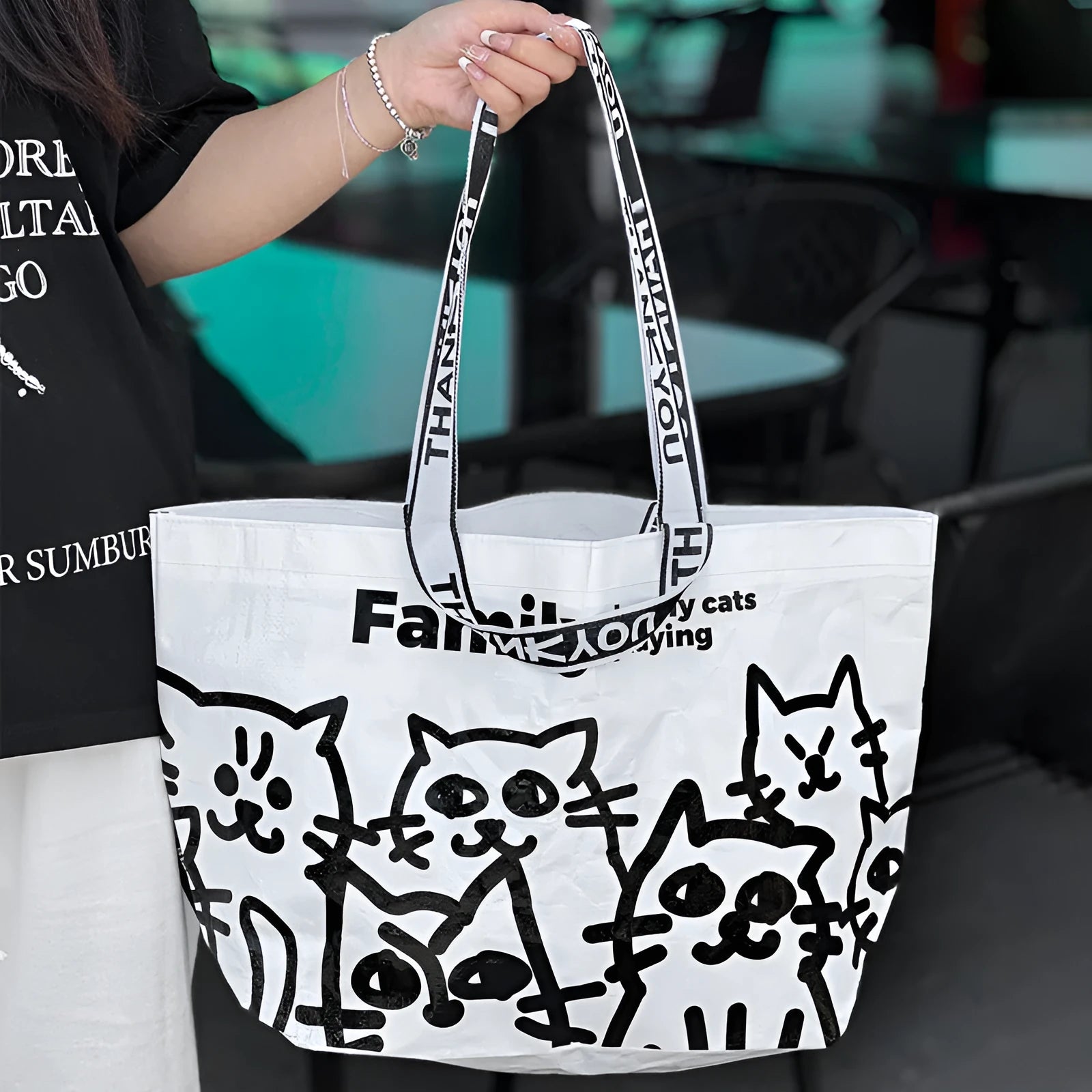 Blue waterproof PP woven handbag with colour printing, shown as portable tote for clothing and cosmetics