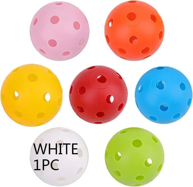 Multi-colour golf practice balls in red, orange, blue, green, white, and yellow shown in a net bag.