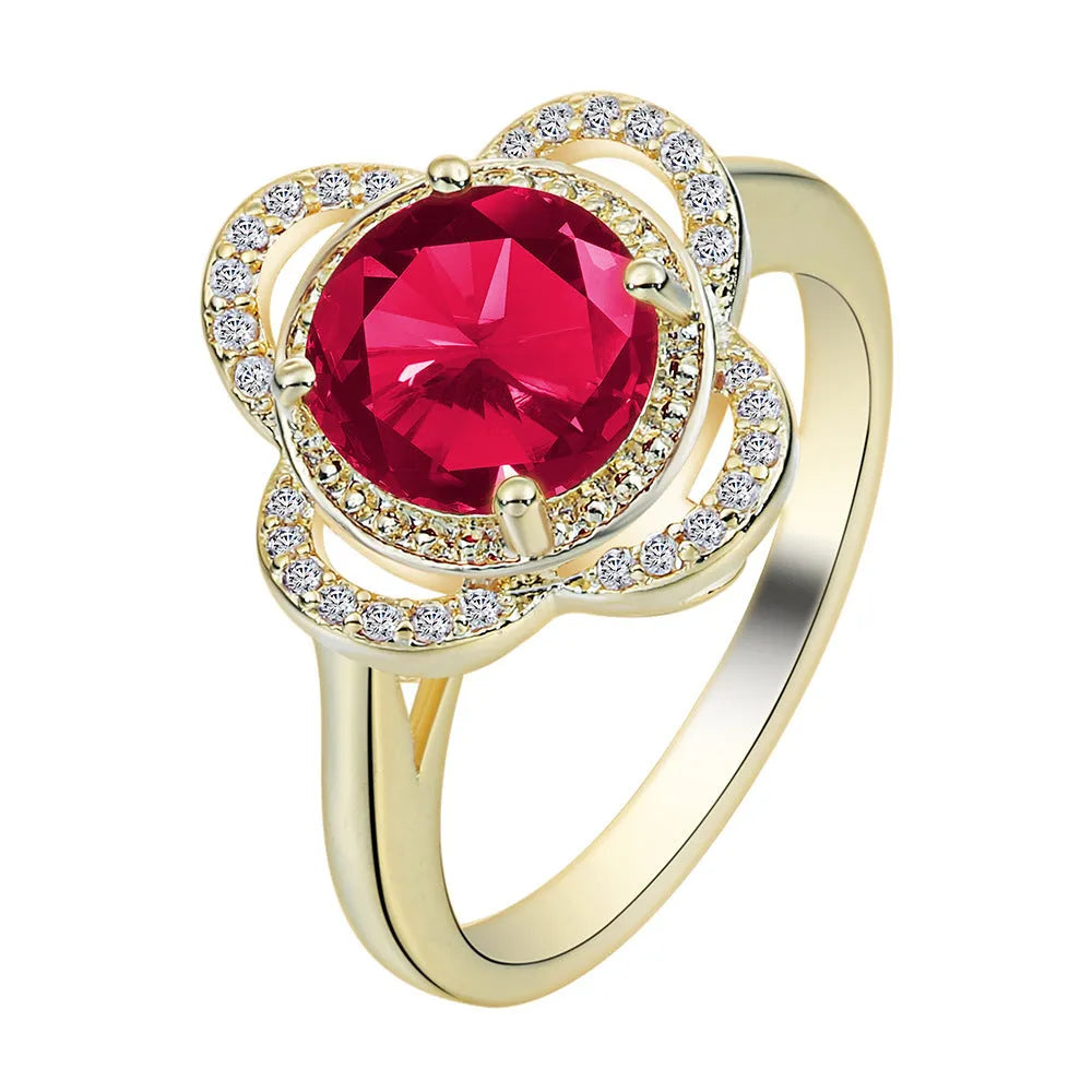Copper ring with a silver-toned zircon fruit-shaped inlay on a band.