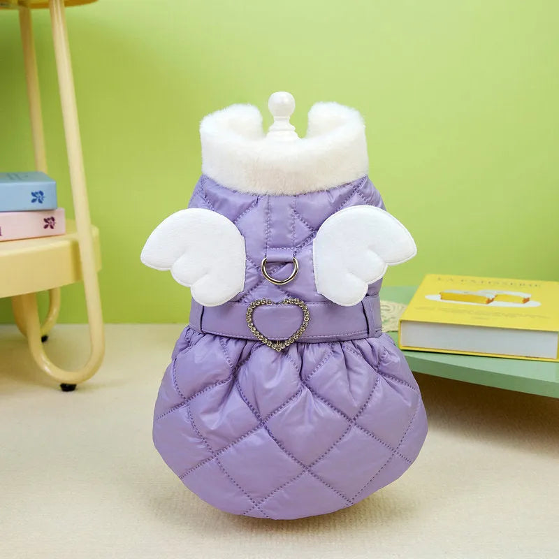 Small dog wearing pink cotton-thickened polyester skirt with cute angel design
