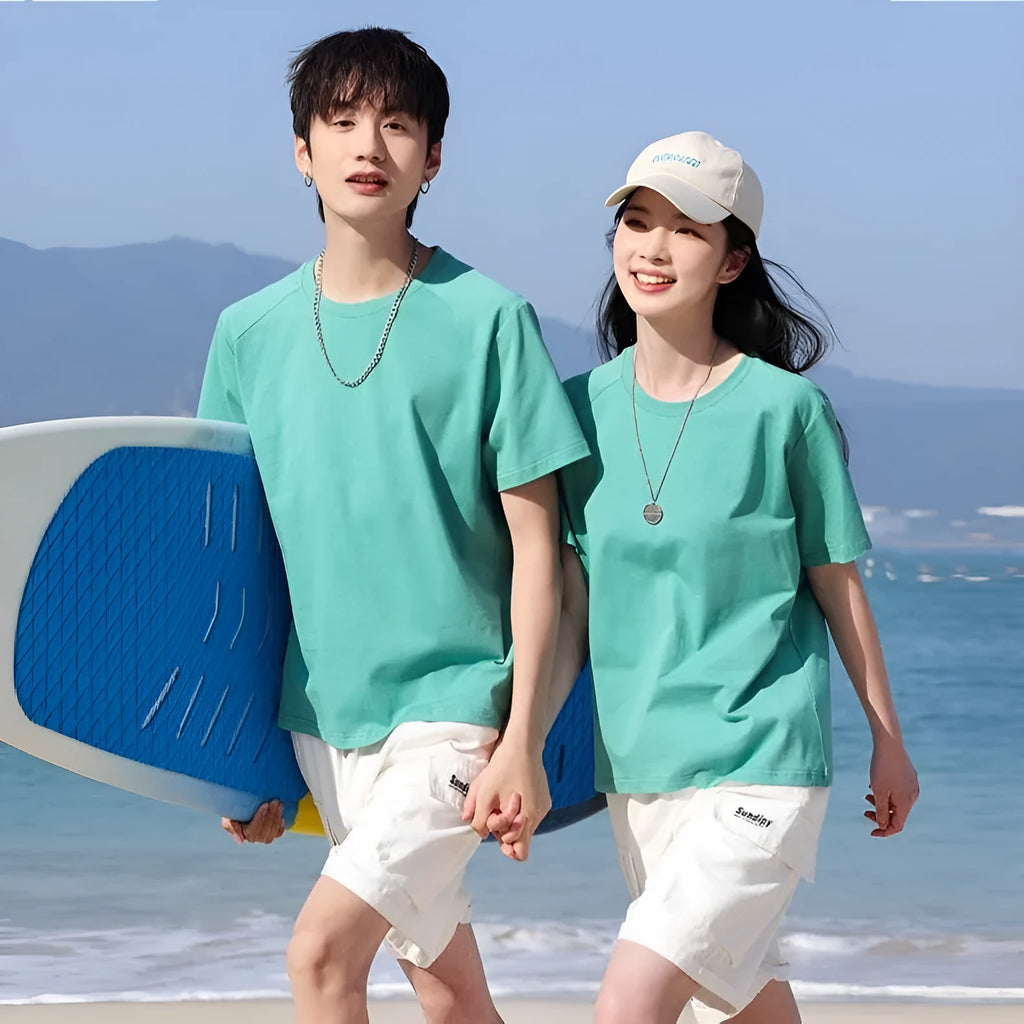 Men's plain pure cotton short sleeve t-shirt on a hanger, shown in multiple solid colours.