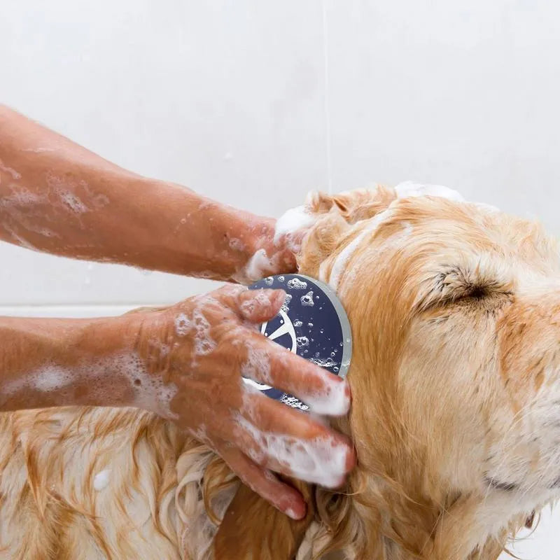 Blue dog shampoo brush with silicone bristles showing 3-in-1 bath tool design