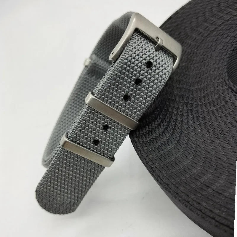 Nylon integrated watch strap in army green colour, showing the 20mm width option.