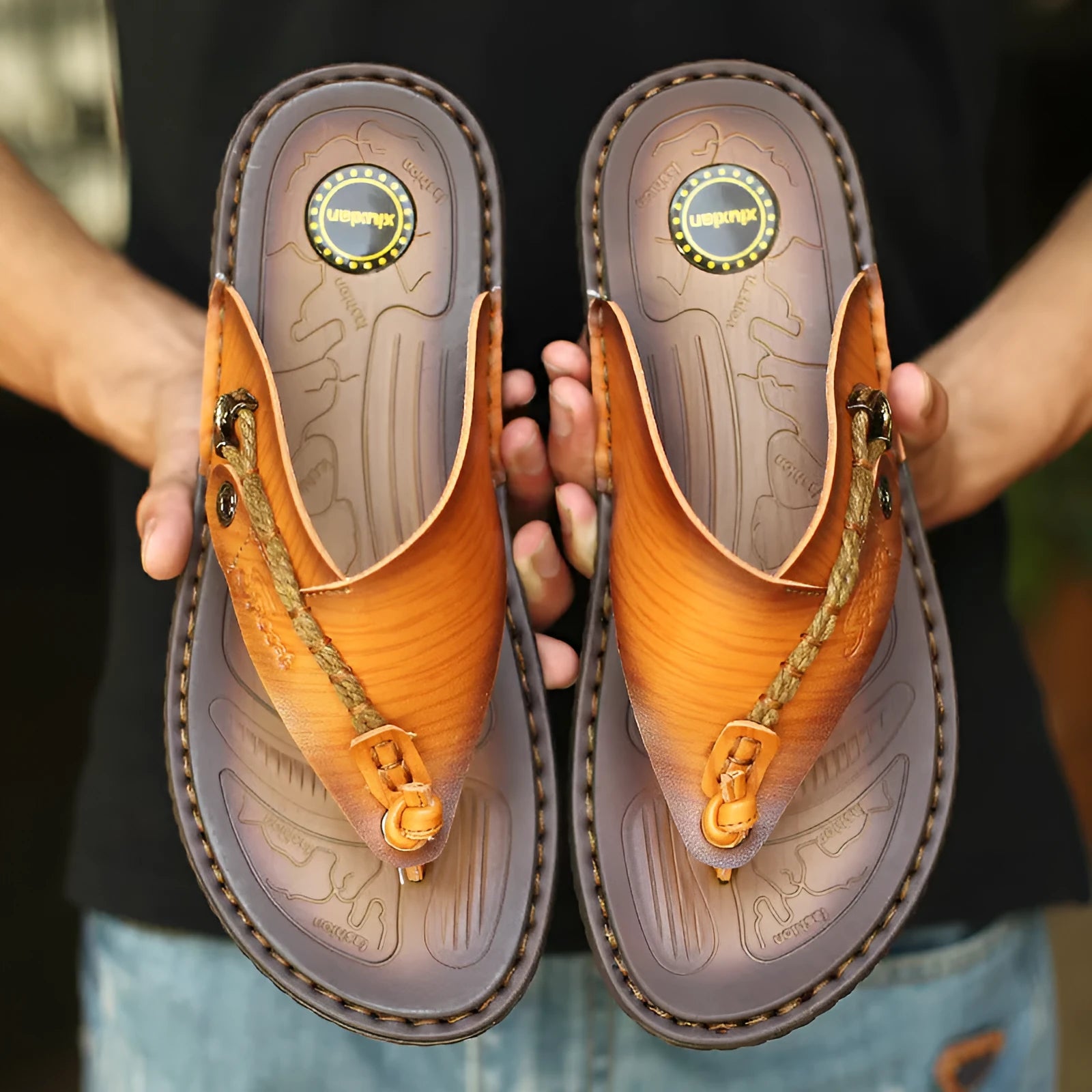 Men's dark blue herringbone pattern outdoor slippers with a rubber sole and leather lining.