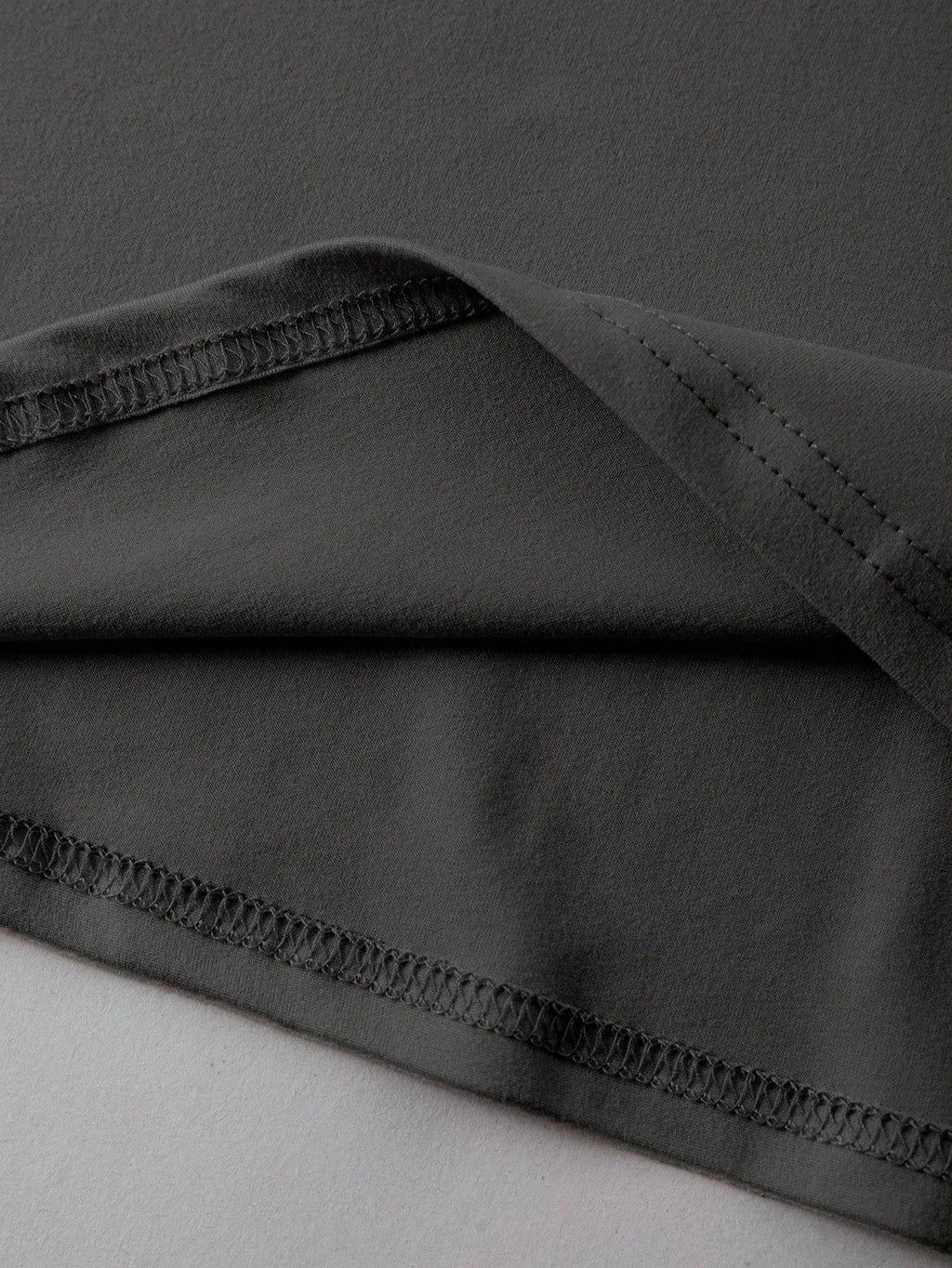 A loose-fit cotton t-shirt with short sleeves and a round neck, shown in various colours.