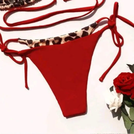 Women's leopard print bikini swimsuit with halter neck and lace-up detailing