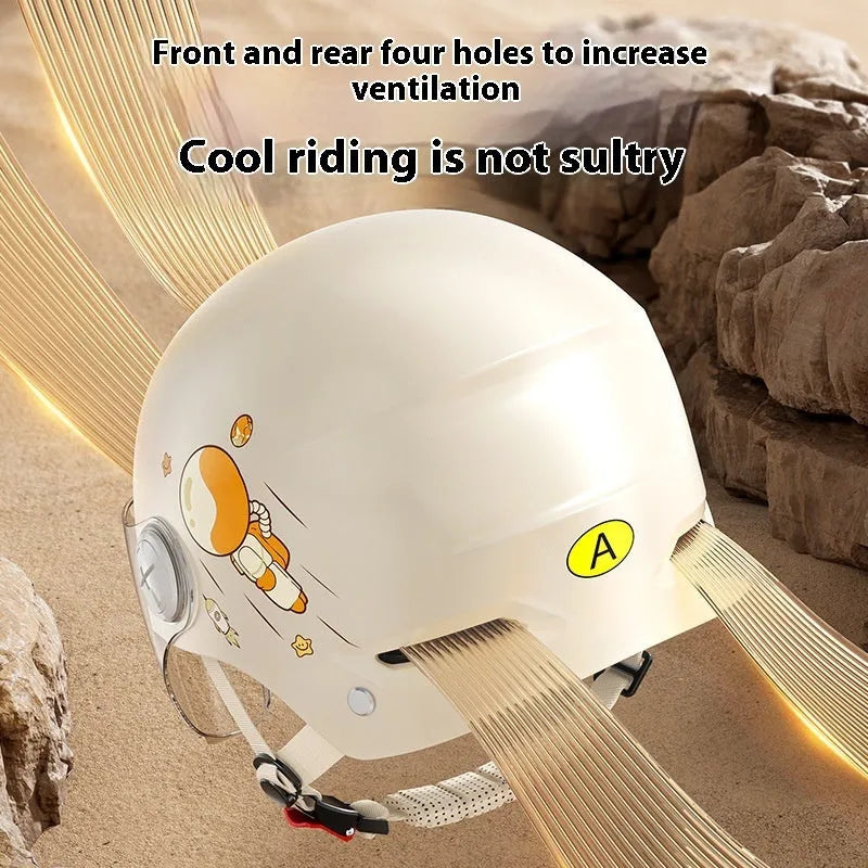 Khaki coloured electric motorcycle half helmet with a long mirrored visor on a table.