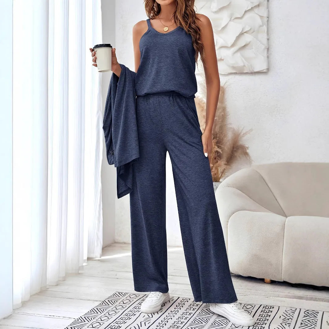 Blue women's three-piece casual suit set with trousers, top, cardigan, and suspenders laid flat.