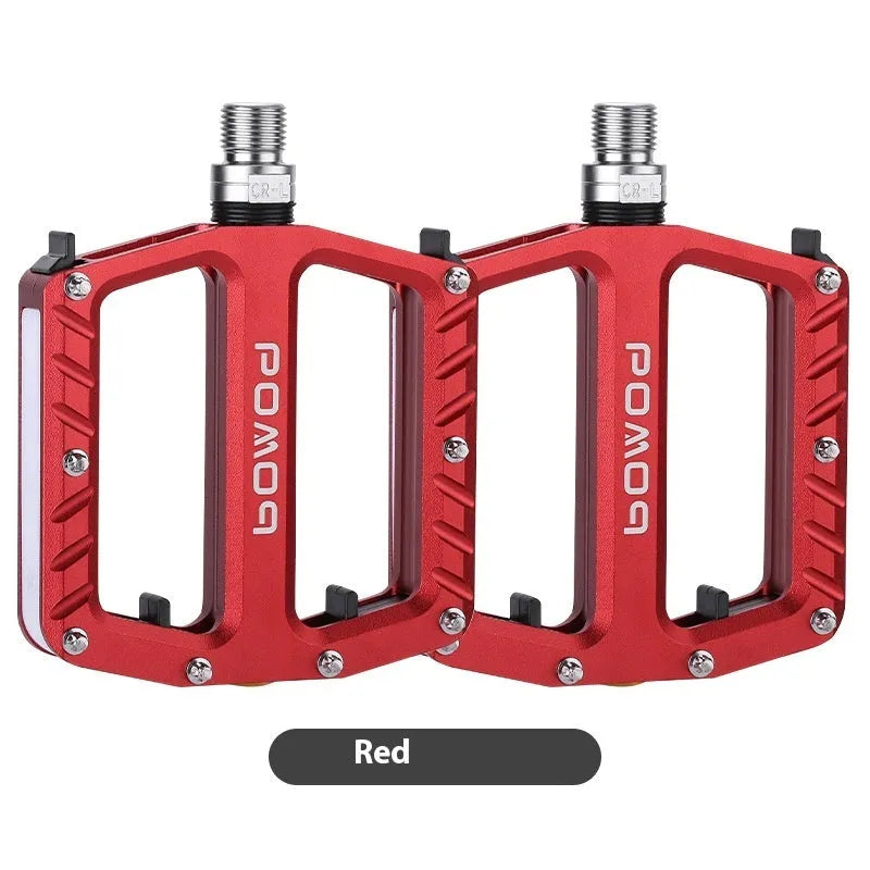 Pair of aluminium alloy bicycle pedals with integrated 710 LED lights in a choice of colours.