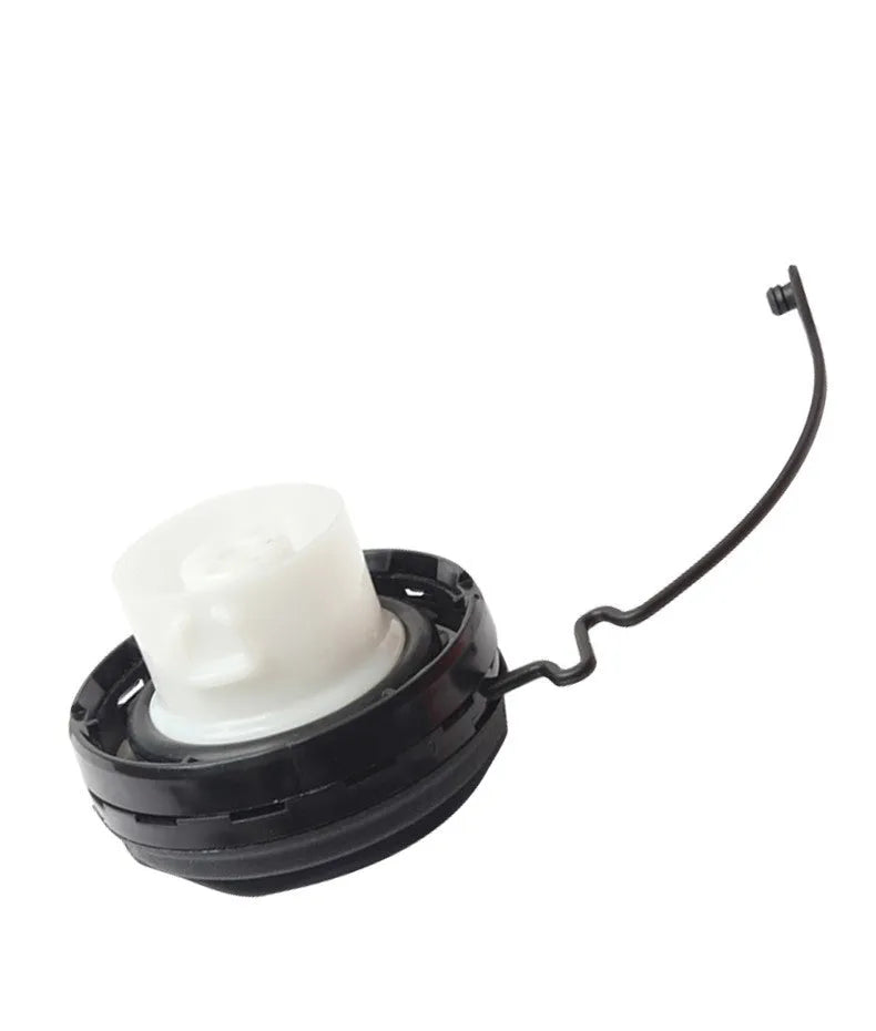 Toyota snap-in type fuel tank cap replacement auto part on white background