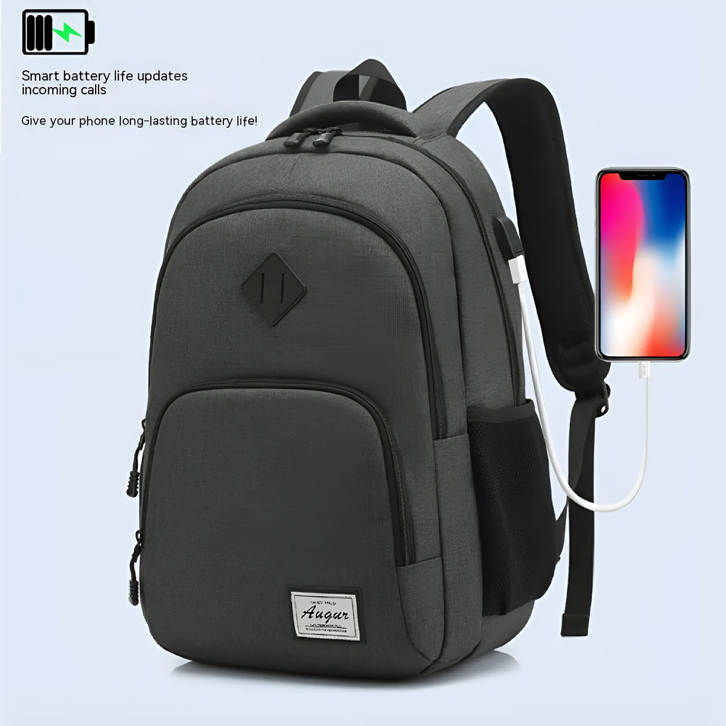 Simple grey and black nylon backpack with USB charging port on side strap.