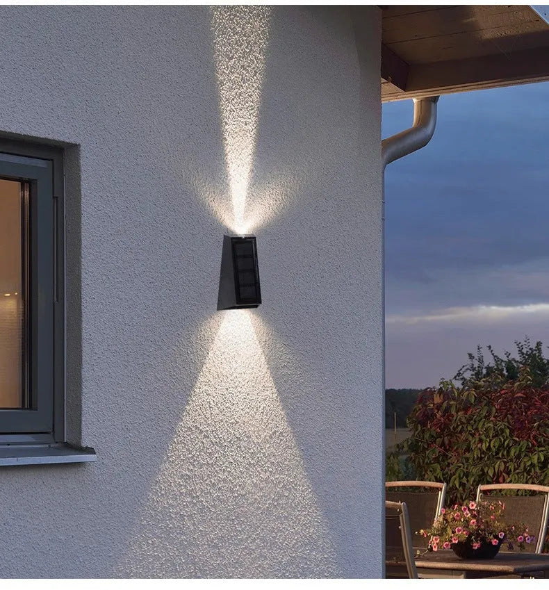 Solar garden courtyard wall light with IP65 waterproof ABS housing and LED glow, monochromatic yellow colour option