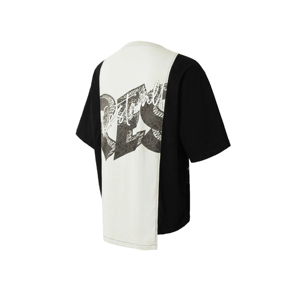 Black and white stitched oversized T-shirt with a broken collage deconstruction graphic print.