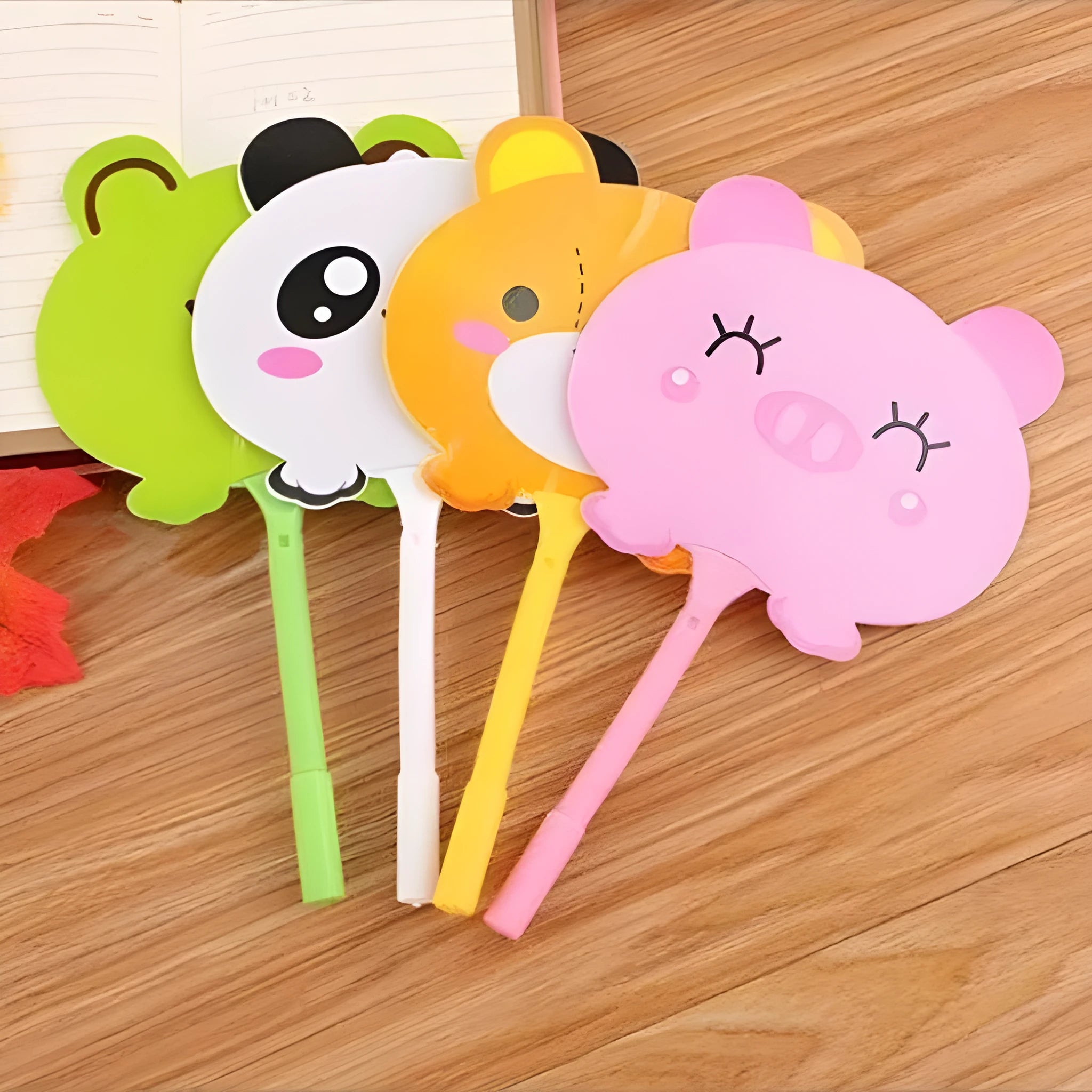Promotional fan ballpoint pen with colourful refill designs including kitten, unicorn, and animal models