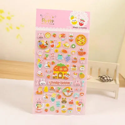 Sheet of cartoon-themed three-dimensional bubble stickers with raised surfaces on various designs like an alpaca, dinosaur, and bow tie cat.