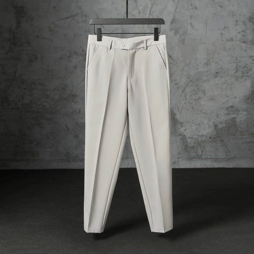 Men's straight leg suit trousers in polyester with brushed finish, light business style, nine colours, sizes 27 to 38.