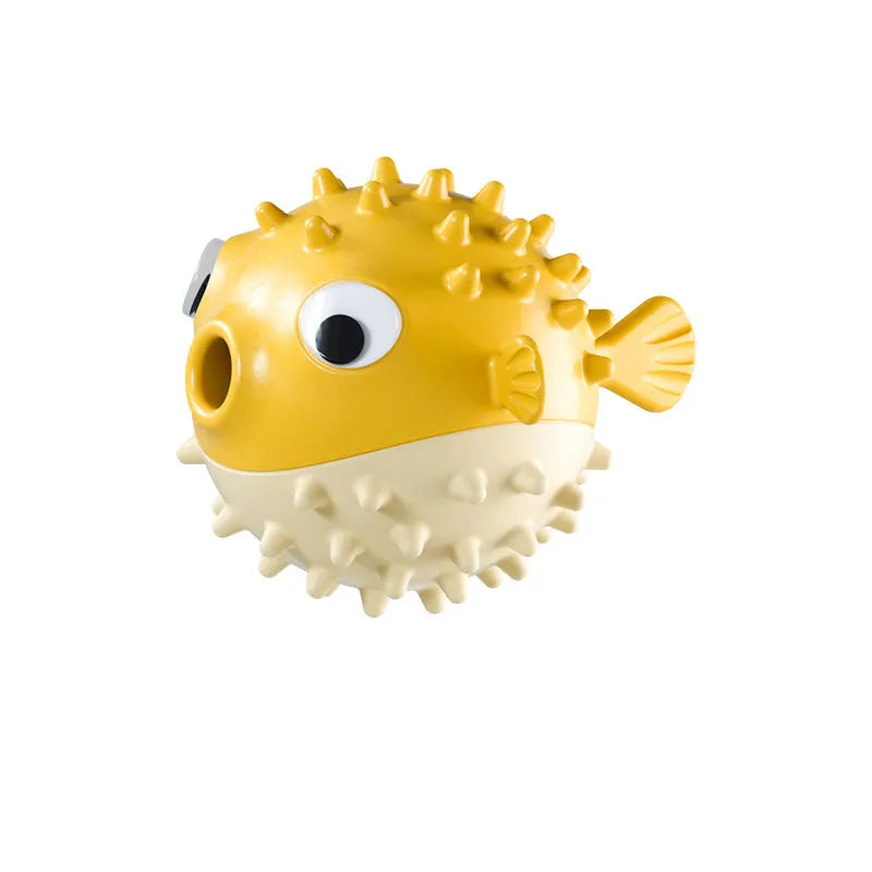 Green fish-shaped interactive dog toy with textured surface for treat dispensing and chewing.