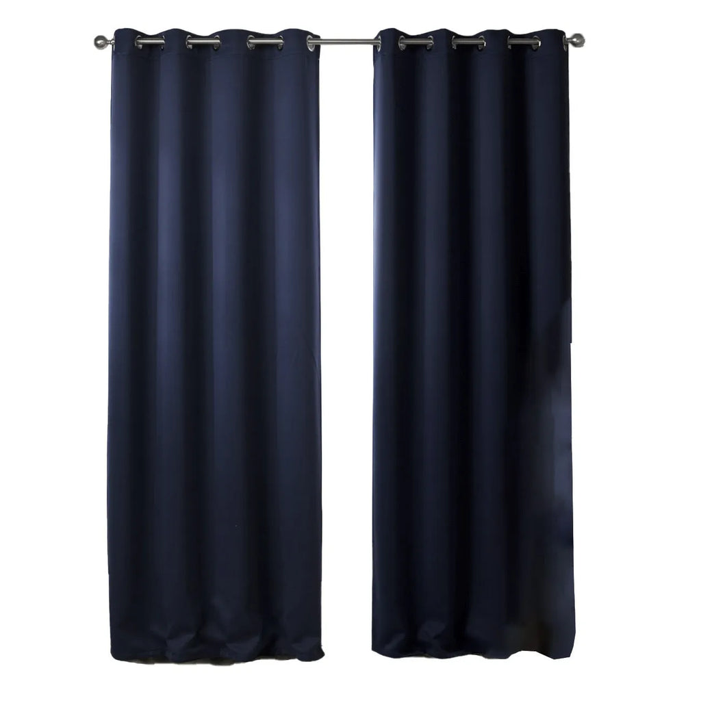 Dark navy blue blackout curtain hanging, showing its modern simple style and light-blocking fabric.