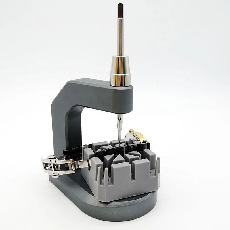 Silver multi-purpose press strap removal tool with a tool steel blade for watch and jewellery repair.
