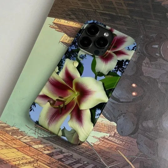 Dark Night Flower retro art design hard shell iPhone case showing large camera hole, for iPhone 15 Pro.