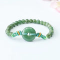 Oil green jade bracelet with safety buckle closure showing star-shaped 6mm beads