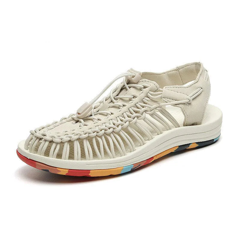 Woven sandals with an elastic drawstring tie closure in a rainbow colour option