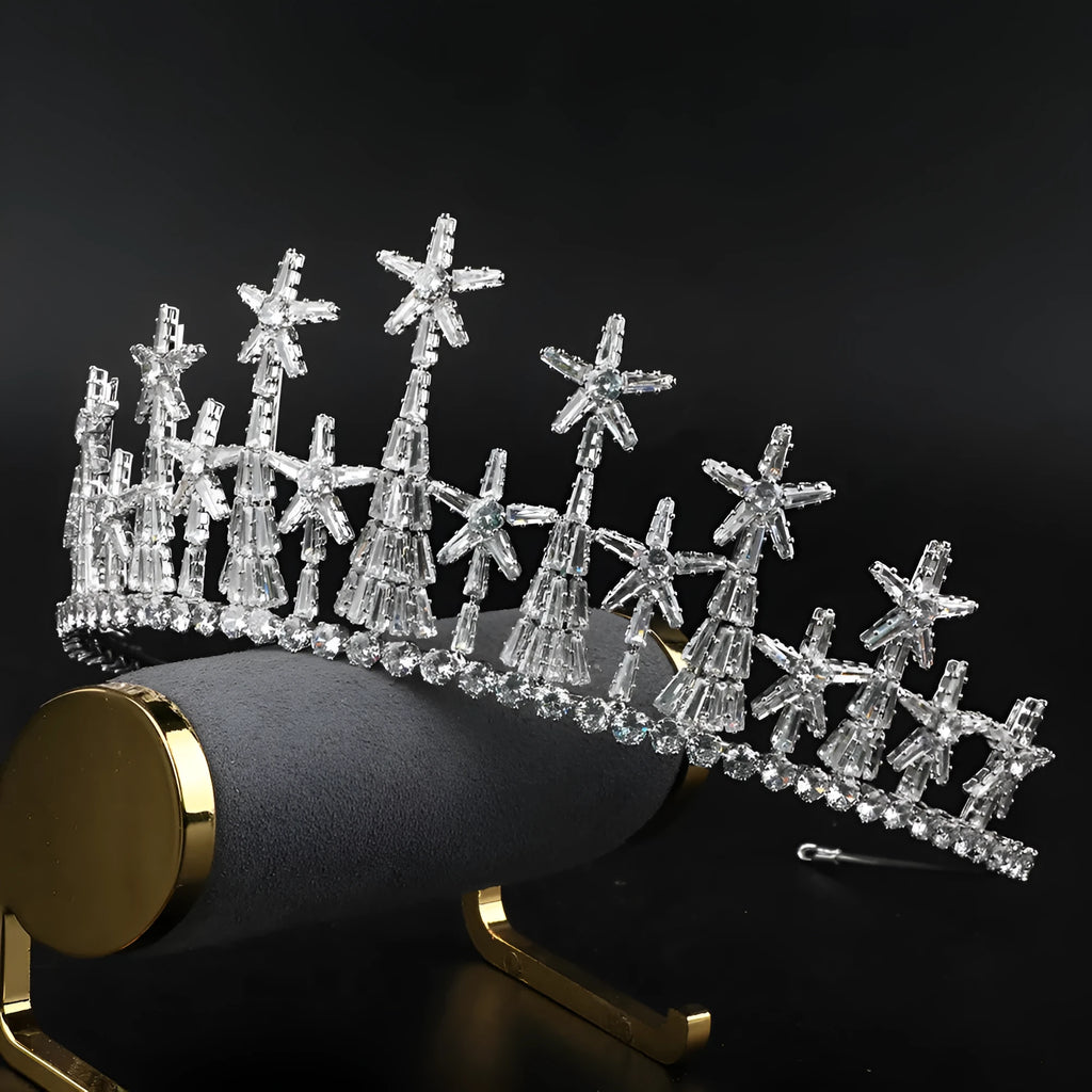 Copper bridal crown with zircon accents in gold finish on a stand
