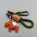 Handmade cowhide car key ring pendant with zinc alloy pony belt buckle on a colourful flanelle rope.