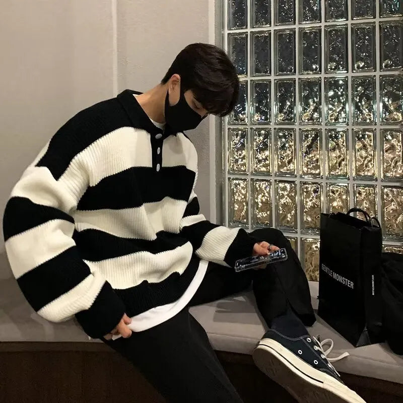 Men's loose fit black and grey striped sweater coat with long sleeves and pullover design