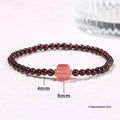 Geometric square garnet bracelet with carved purple pixiu charm on wrist