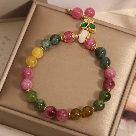 Women's tourmaline butterfly pendant bracelet with natural jade colour stones and rhinestone accents