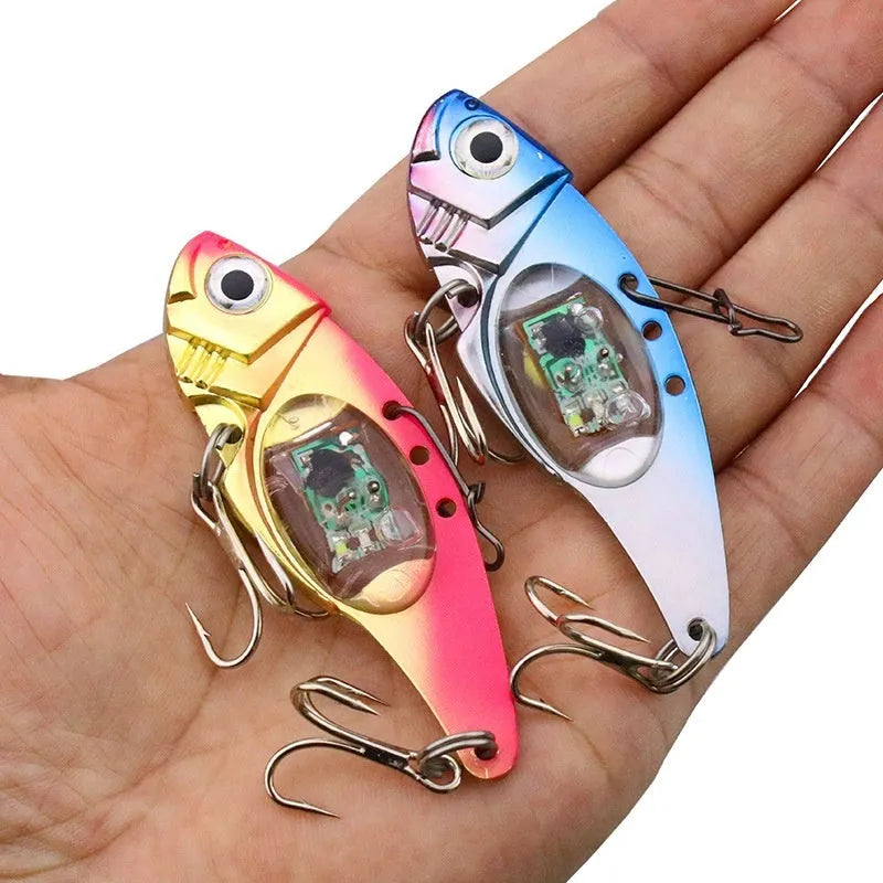 Luminous Metal Vib electronic fishing lure shown in blue body and red body colour options