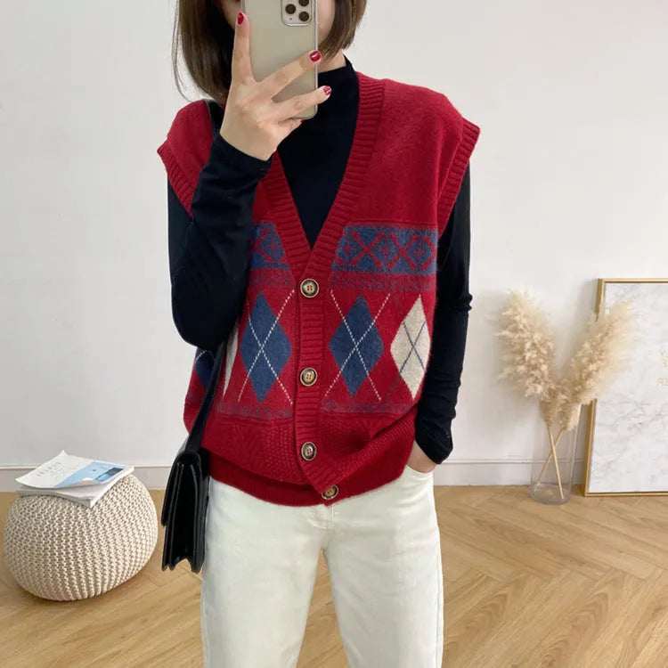Khaki sleeveless loose cardigan top with diamond plaid pattern, open front.