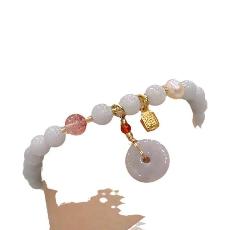 Women's gold-plated bracelet with artificial crystal and chalcedony pendant in climbing cat design