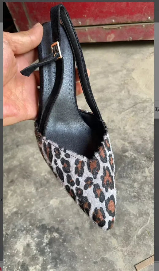 Leopard print suede women's sandals with a scattered pointed toe design on a high heel.