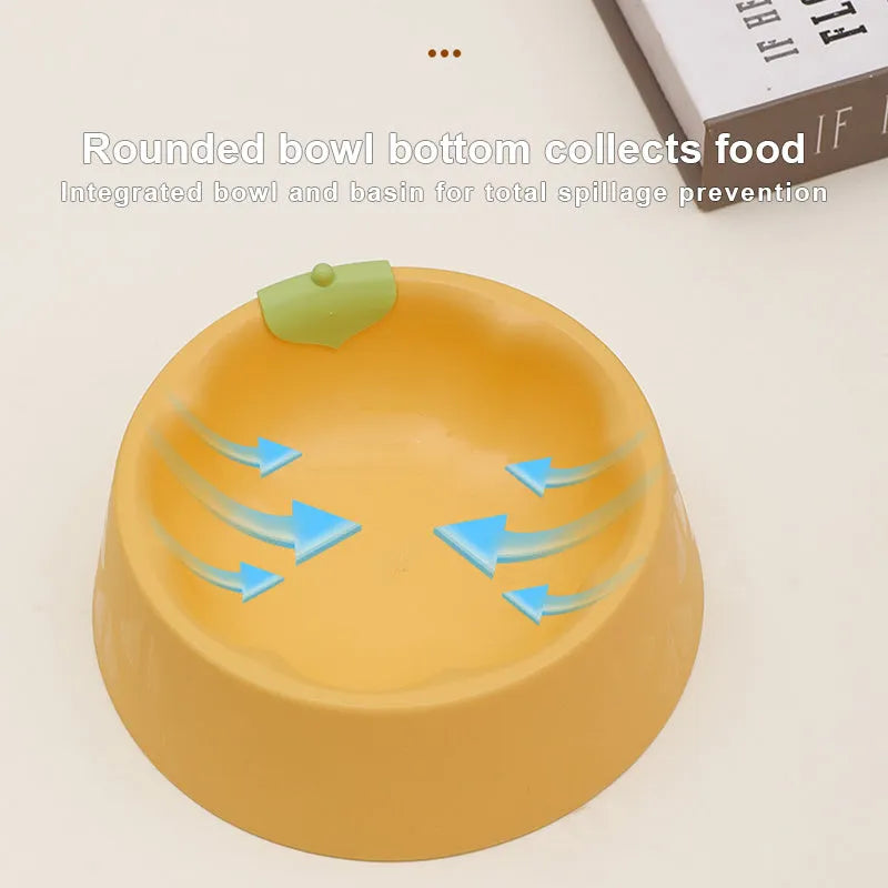 Green flower-shaped plastic double bowl for cat or small dog food and water on a plain surface.