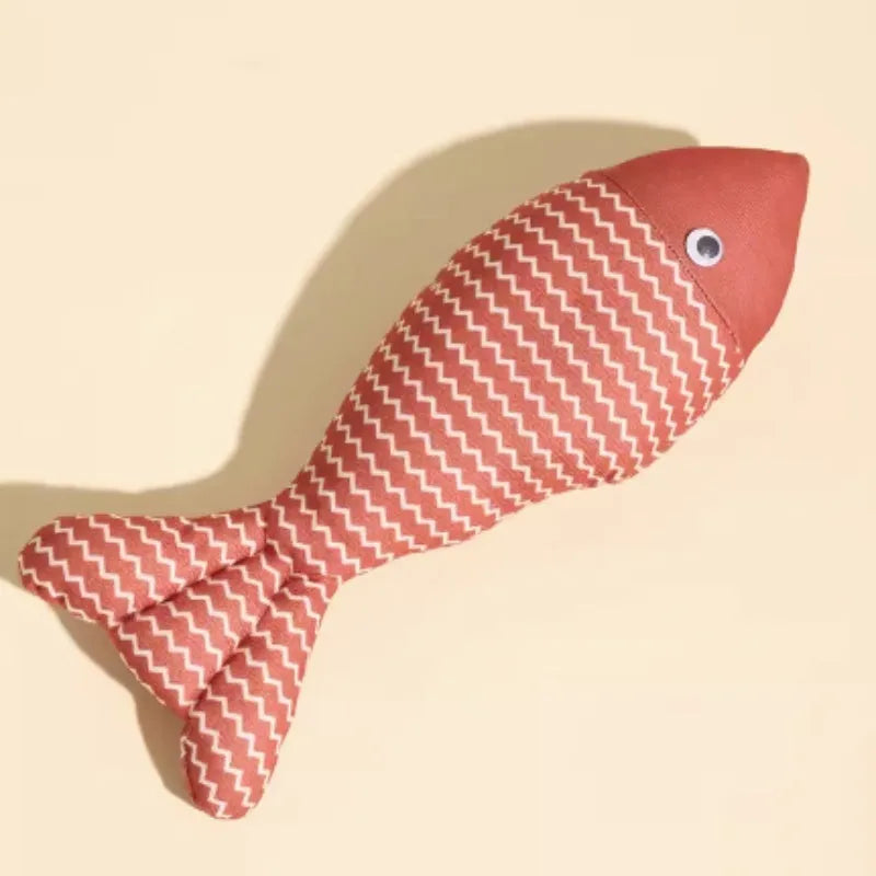 Blue, red or yellow catnip fish toy with natural filling for feline energy and dental health