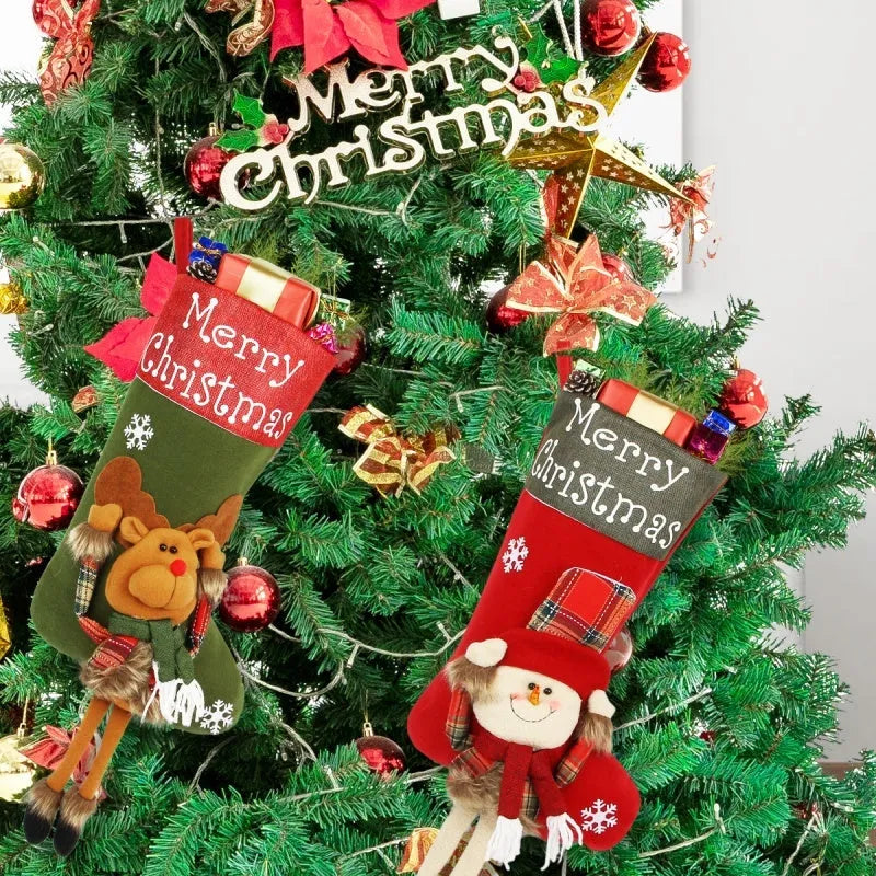 Set of three large red, white, and brown Christmas stockings featuring 3D Santa, Snowman, and Reindeer designs with hanging loops