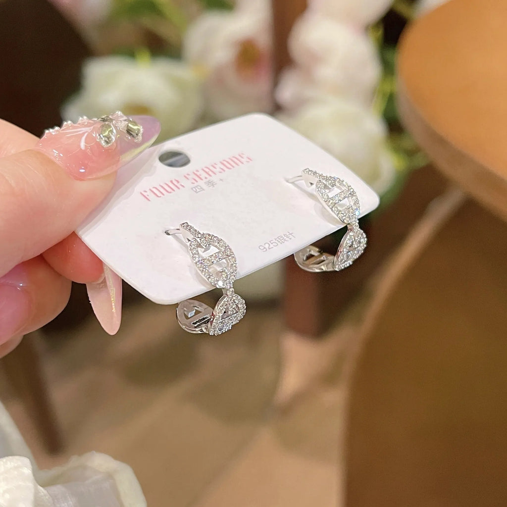 A pair of ladies casual earrings with a diamond design and thick gold plating in silver, gold, or rose gold colour.