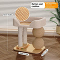 Solid pine cat bed with enclosed sides and two tall sisal scratching posts, featuring a reversible plush sleeping mat inside.
