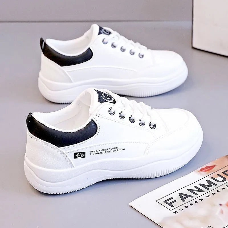 Women's white Korean-style leather shoes with cross straps and lace-up front