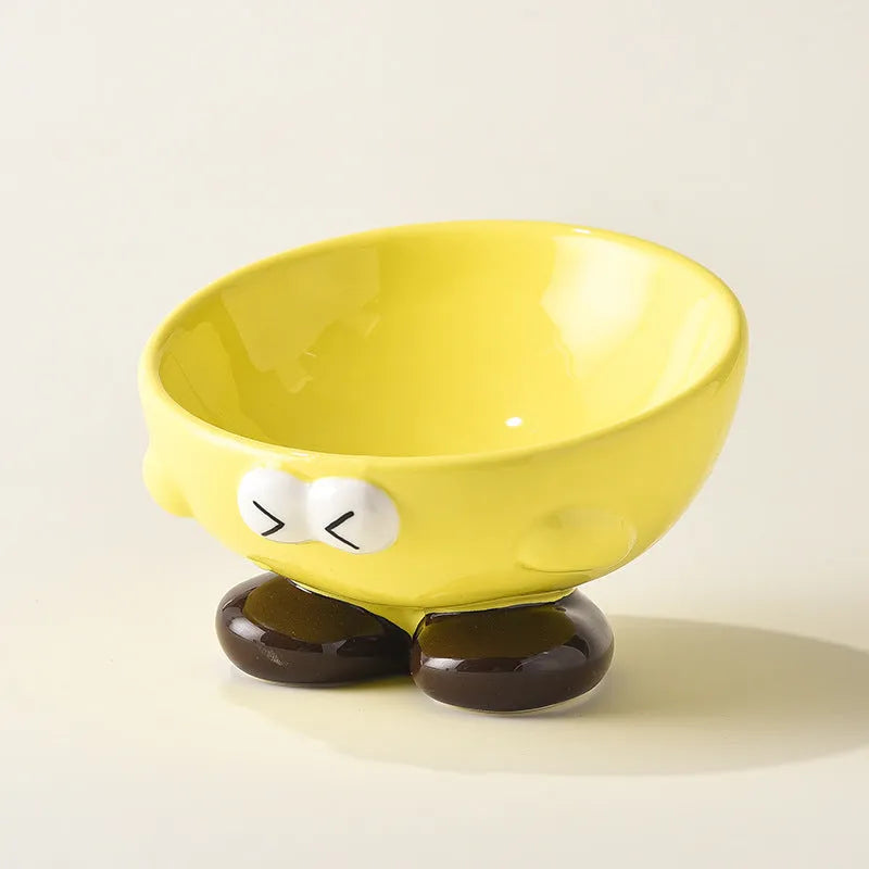 Ceramic pet bowl with oblique design and cute expressions for cervical spine protection