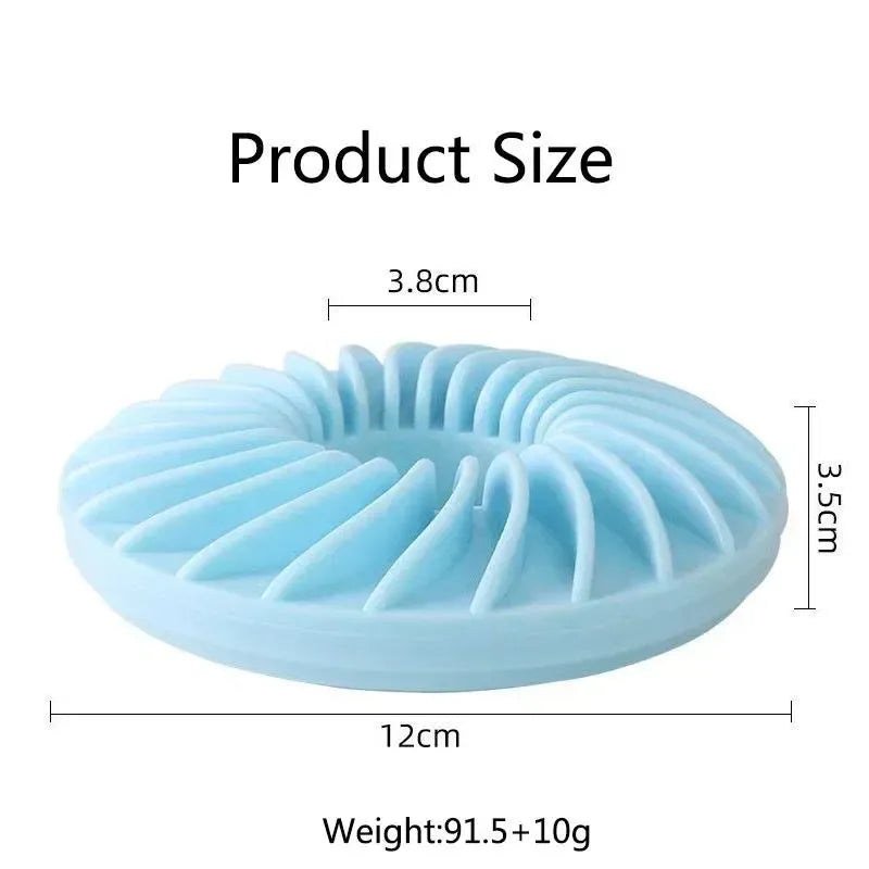 Soft round TPR leakage food pet toy for puppies, available in blue, green, and pink