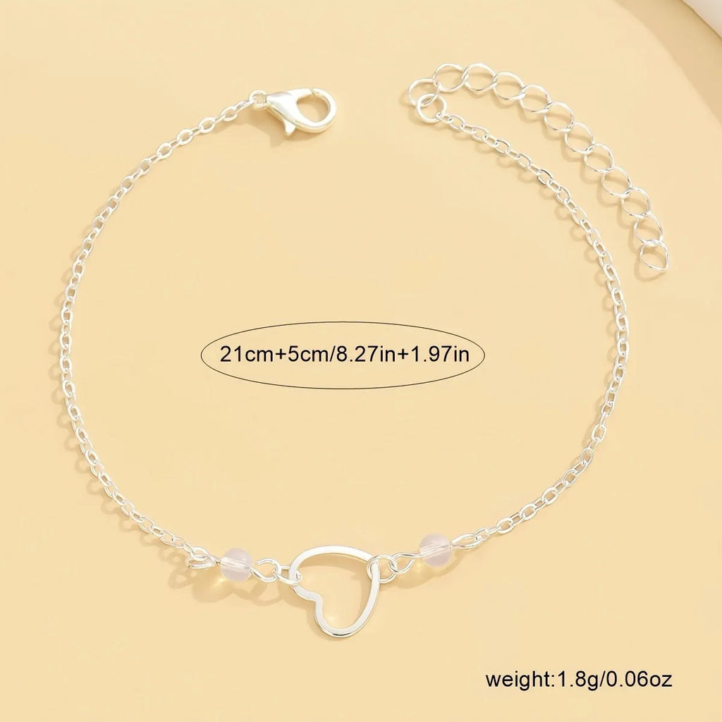 Women's gold and silver adjustable heart anklet with geometric minimalist design