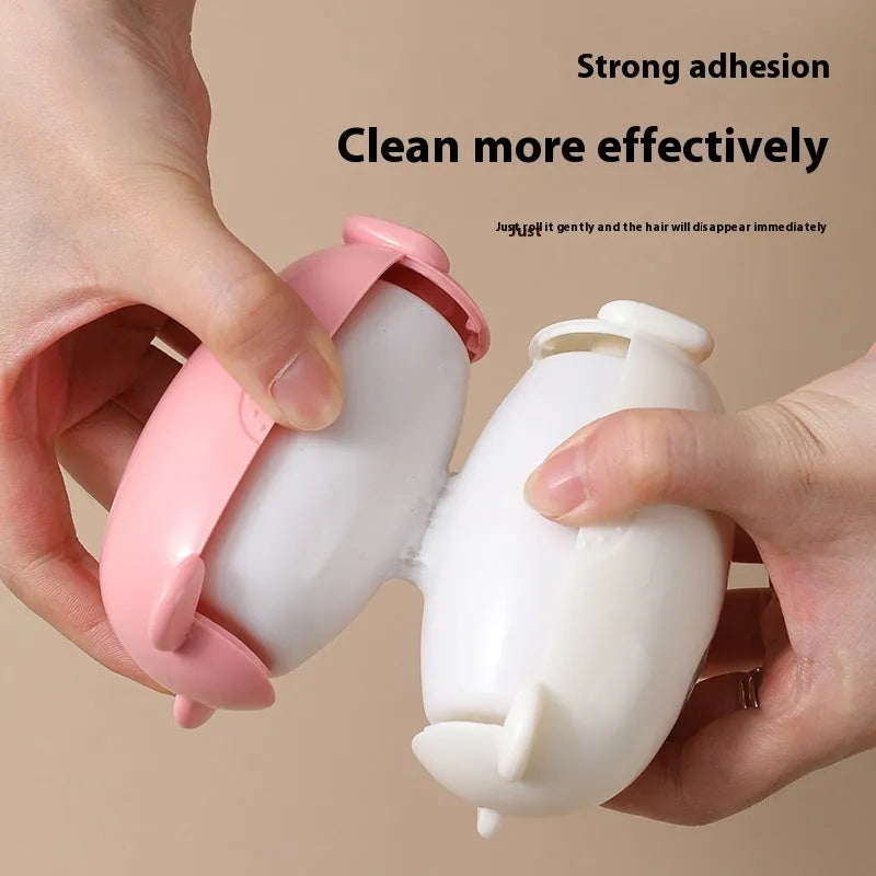 Washable silicone lint removal roller in green, pink, or white colours on fabric surface