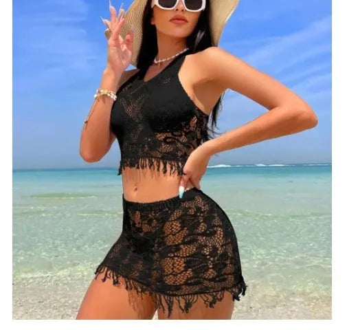 Women's white two-piece bikini swimsuit with lace briefs and matching tassel skirt beach cover-up