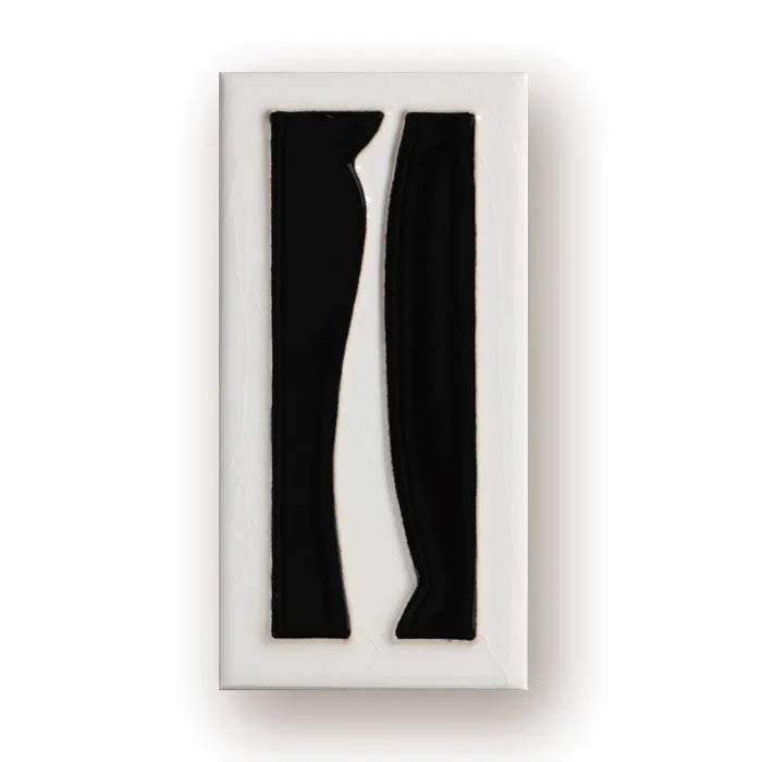 Handmade retro-style ceramic doorplate with fired enamel number, shown against a door.